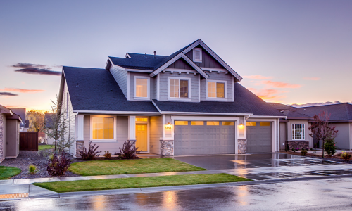 Home with the lights on at dawn